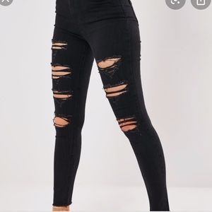 black ripped american eagle jeans